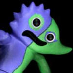 A humanoid creature that is purple and spikey on one side and green with a singular spike on the other. Half of his mouth is frowning, and the other half is smiling.