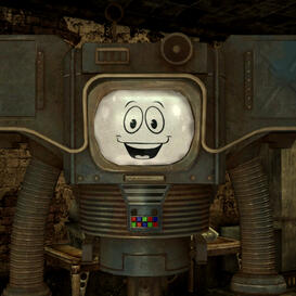 A bulky rusted robot with multicolored buttons on the front displaying a smiling face on its screen