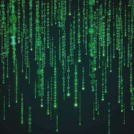 Green strings of computer code against a black background